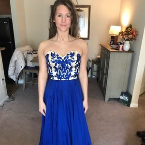 A Sherrie Hill 100% polyester prom dress.